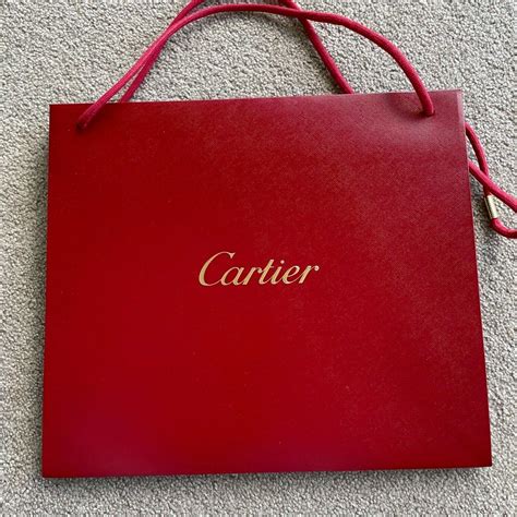 cartier shopping bag button